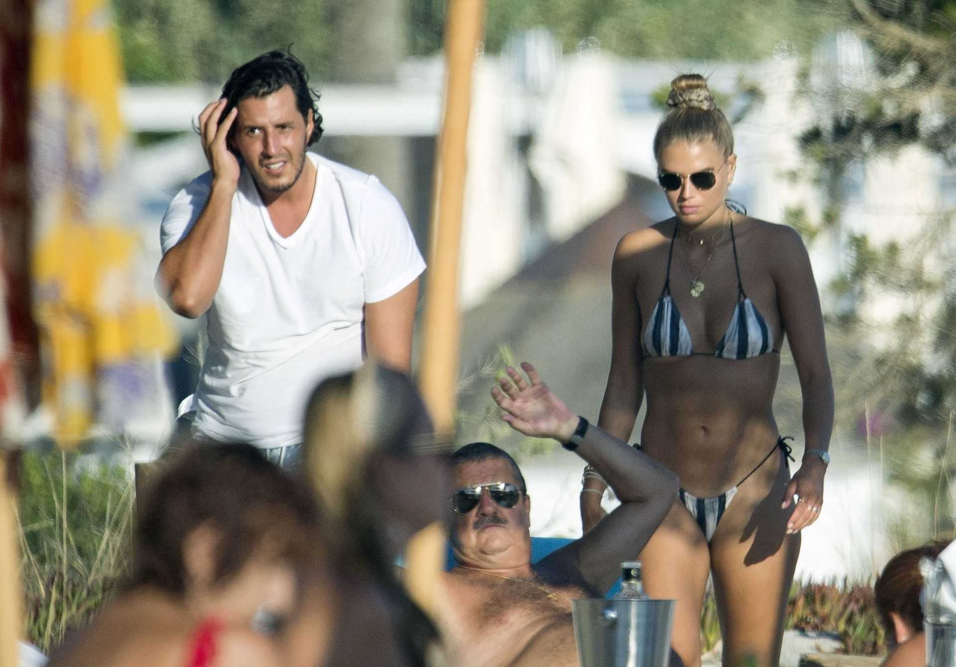 Exclusive: love island's arabella chi flaunts her incredible figure in a tiny thong bikini for a photoshoot in saint tropez after enjoying a summer break with leonardo dicaprio